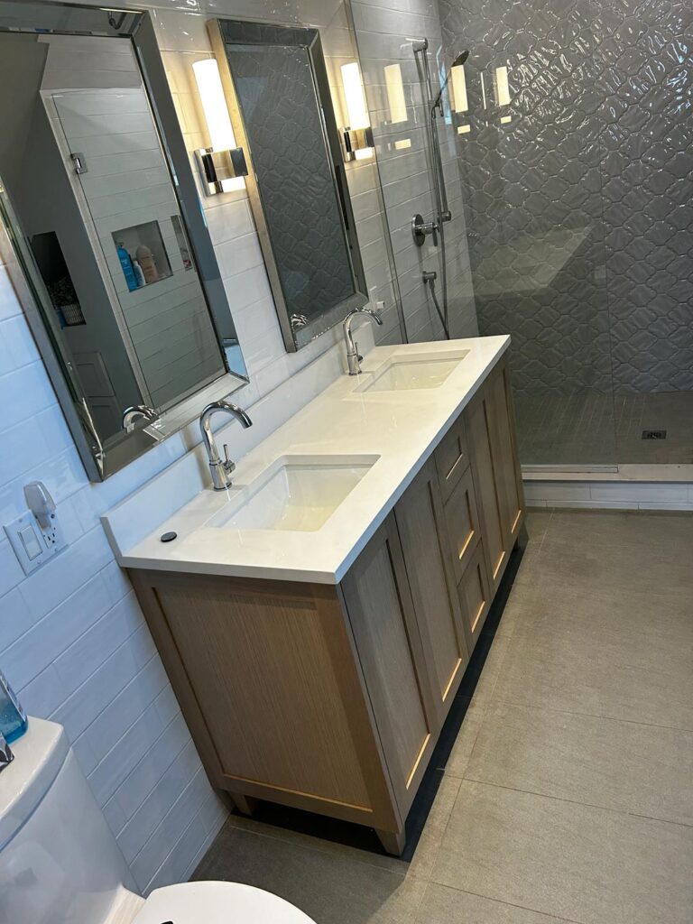 His/her sink in renovated bathroom